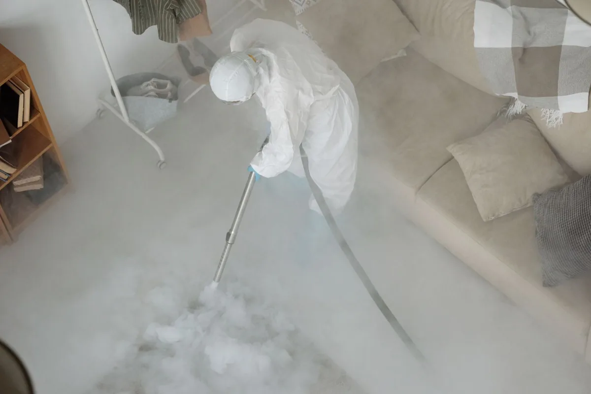 Biohazard cleanup technician in protective equipment, Port Ludlow, WA